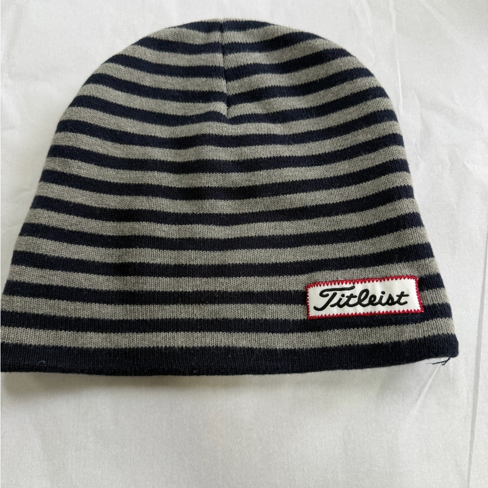 Titleist gray and navy blue stripe beanie style hat.  Fabric 100% cotton. OS